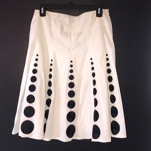 Black and white knee length skirt.